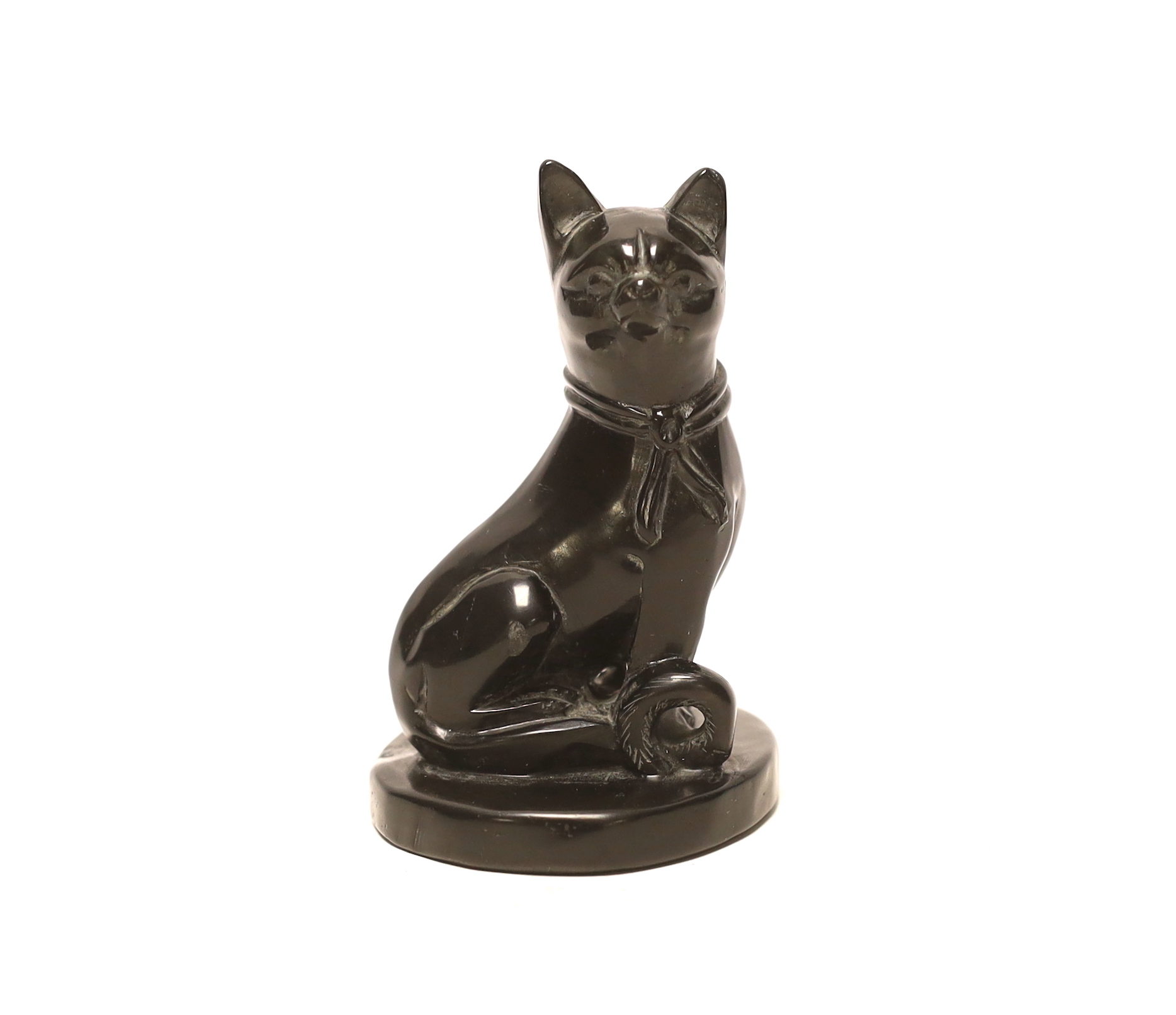 A polished jet carved cat, 8.5cm